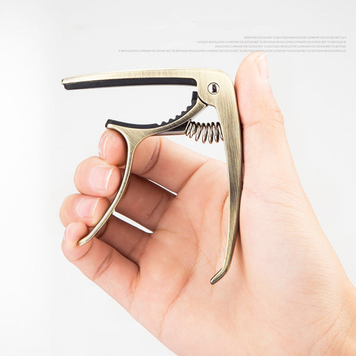 Folk acoustic guitar capo